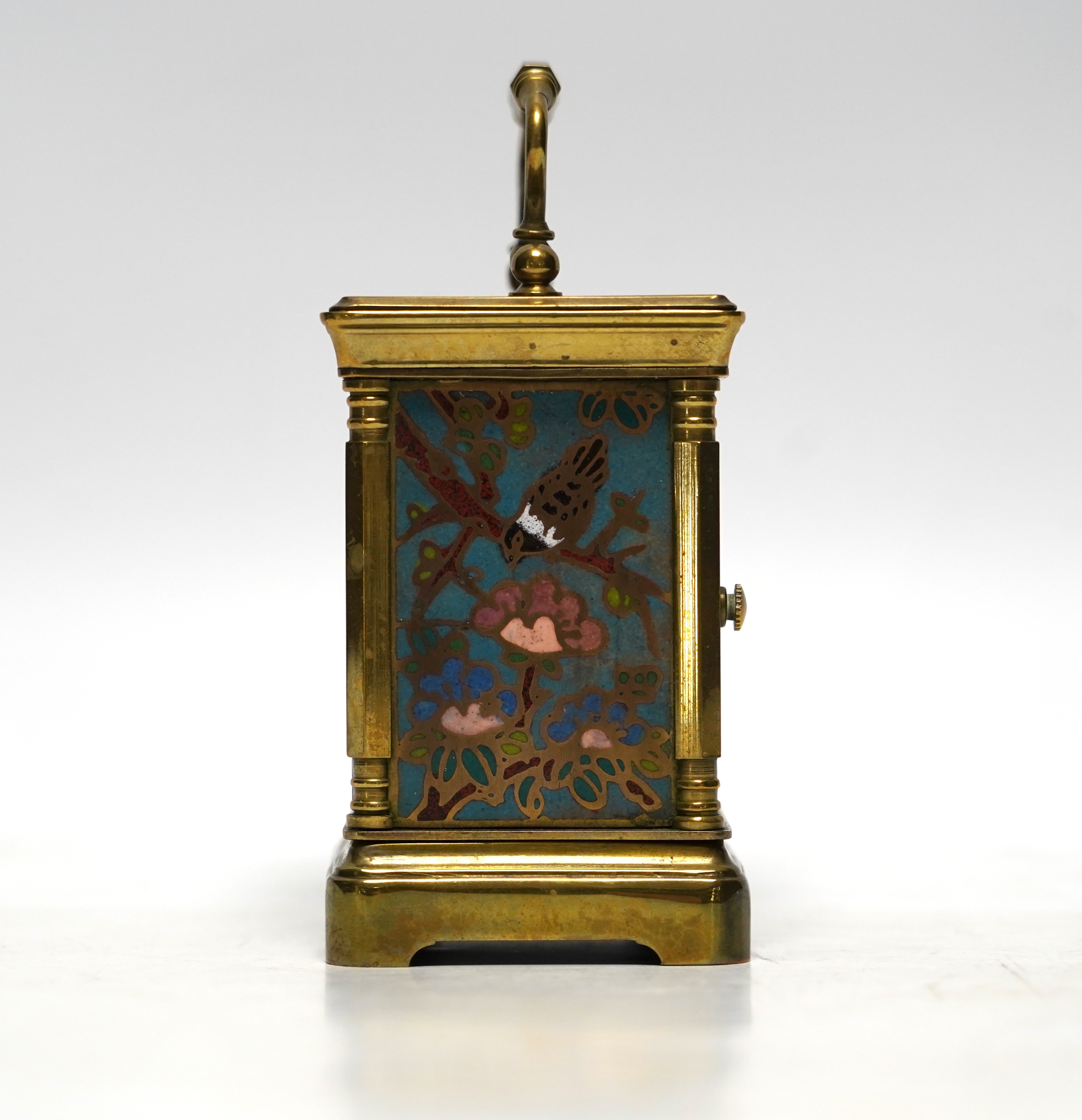 A miniature French brass carriage clock, with champlevé enamel panels, face signed Elliott & Son, London, 8.5cm